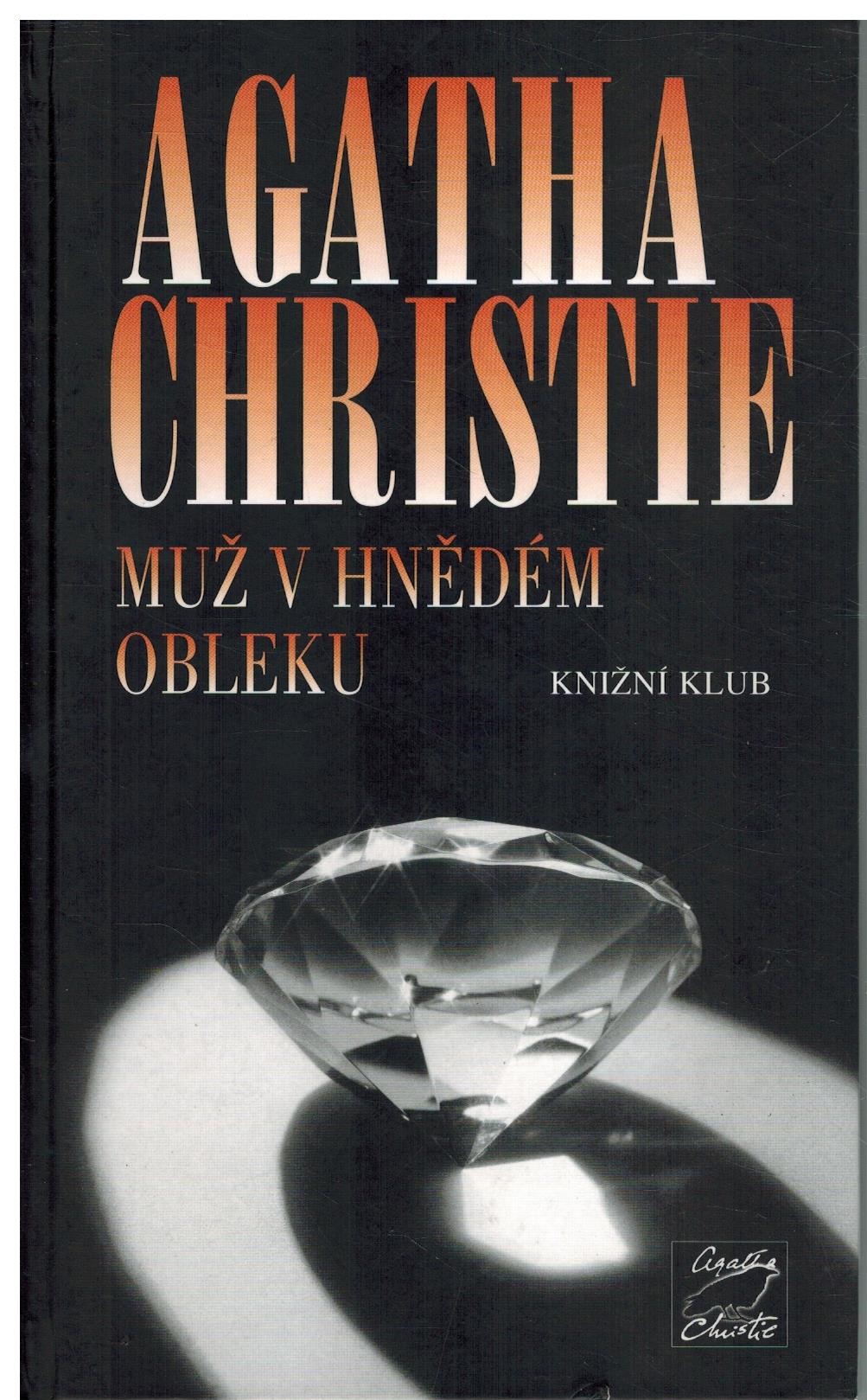 MUŽ V HNĚDÉM OBLEKU